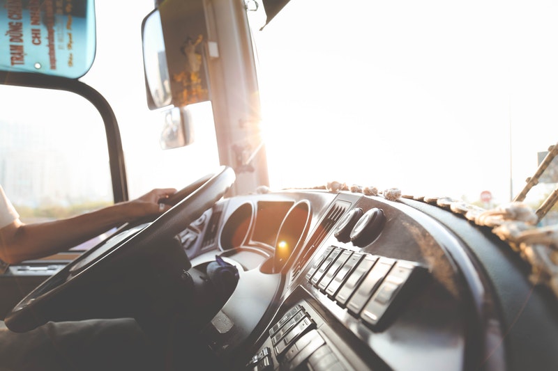 person-hand-on-steering-wheel-977213 bus driver steering