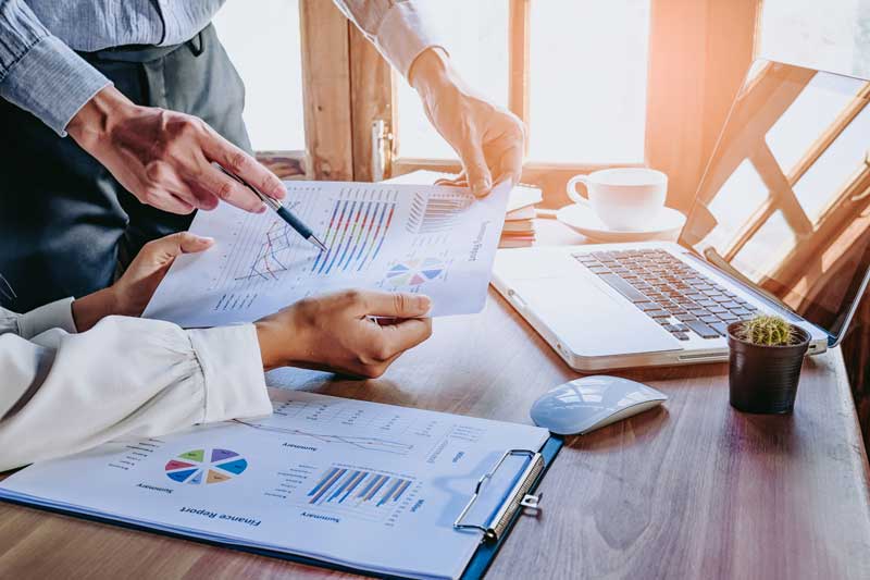 Business people reviewing documents